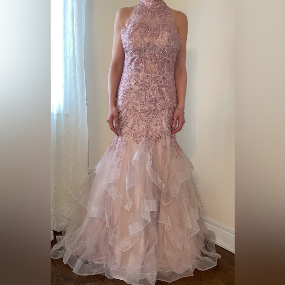 Pink lace dress with embroidered beads and tulle frills